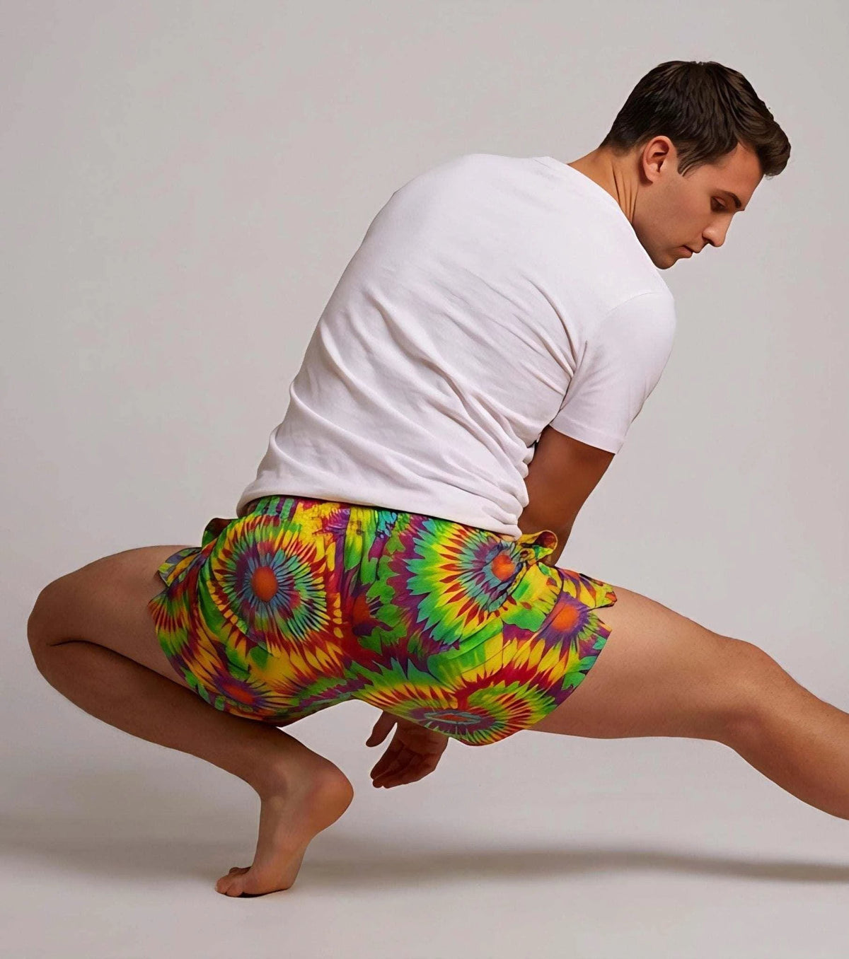 Neon Radial Burst Athletic Shorts - Vibrant Psychedelic Swim Trunks for Bikram Yoga & Rave Fitness by Aesthetic Rebellion
