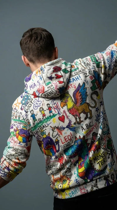 Avant-Kindergarden collection by Aesthetic Rebellion — hand-drawn, intentionally imperfect doodle-style graphics on all-over-print streetwear.