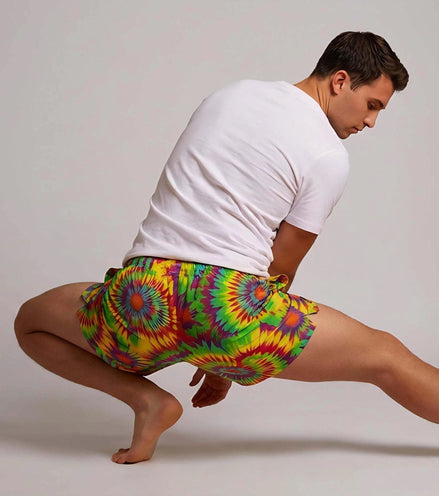 Neon Radial Burst Athletic Shorts - Vibrant Psychedelic Swim Trunks for Bikram Yoga & Rave Fitness by Aesthetic Rebellion