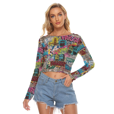 Frisco Sticker Collage mesh long sleeve top by Dyles Mavis — sheer mesh fabric with all-over print of San Francisco travel sticker collage including bridge, cable car and neighborhood name graphics, worn by a woman with denim shorts