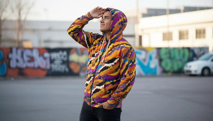 Crisp Burn painted strata zip hoodie in amber, magenta, mustard, cream, and electric blue painterly bands