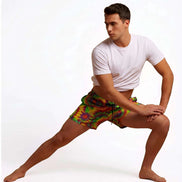 Neon Radial Burst Athletic Shorts - Vibrant Psychedelic Swim Trunks for Bikram Yoga & Rave Fitness by Aesthetic Rebellion