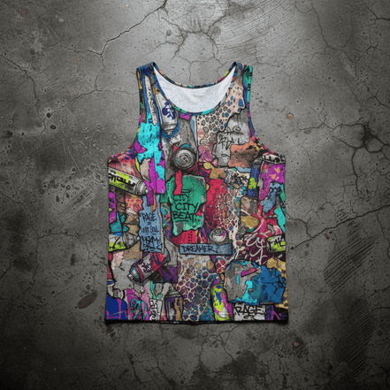 Chaos Crew Y-back tank top by Dyles Mavis — muscle-cut tank with all-over print of a dense graffiti collage featuring spray cans, tags and street art panels in teal, magenta and gold, front flat lay on concrete
