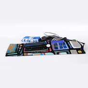 Blue Hour Collage sports towel by Dyles Mavis — cooling towel with all-over print of an abstract painterly collage in navy, coral, teal and cream blocks, rolled with a tennis racquet and water bottle