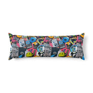 Gadget Pop AOP Body Pillow — long body pillow with retro tech pop art collage AOP featuring boomboxes, vinyl records, cameras, headphones, and skateboards in vivid pink, cyan, and yellow on dark navy. Aesthetic Rebellion.