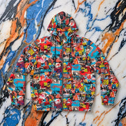 Street Collage Full-Zip Hoodie — full-zip lightweight hoodie with torn poster layered street art collage AOP in red, blue, yellow, and cyan. Gold zipper, elastic cuffs. Aesthetic Rebellion.