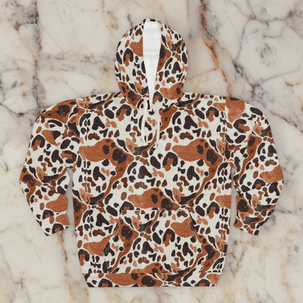 Leopard Spot AOP Hoodie with all-over leopard spot print in cream, rust brown, and black on 250gsm polyester, back view flat lay