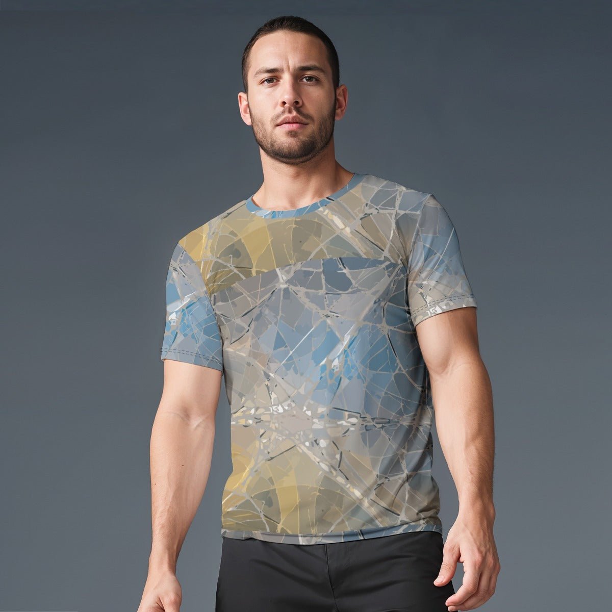 Nimbus Drift Performance Tee on model, ethereal marble fluid art print in slate blue and deep charcoal with warm smoky parchment veins across full crewneck tee