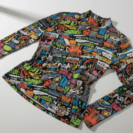 Long-sleeve turtleneck with dense neon graffiti tags all-over print in multiple colors