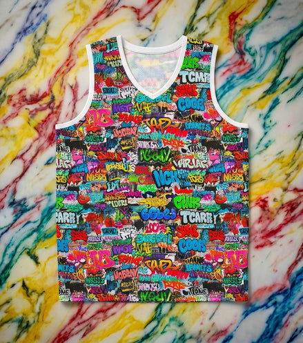 Basketball jersey with hot pink, cyan, and yellow neon graffiti tag wall all-over print